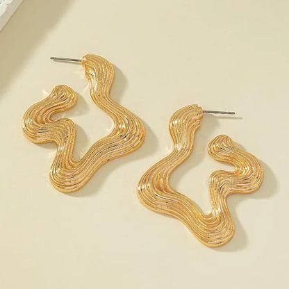 Sculptural wave statement earrings