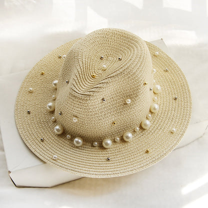 Elegant sun hat with pearl embellishments