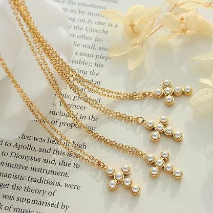 Cross pendant necklace with imitation pearls