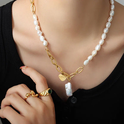 Pearl accent necklace with love pendant