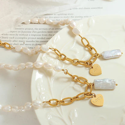 Pearl accent necklace with love pendant