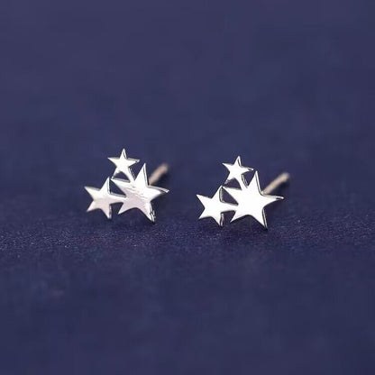 Silver coloured stud earrings for women