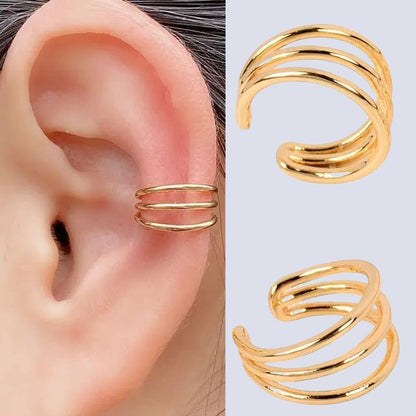 Spiral ear cuff with shiny surface