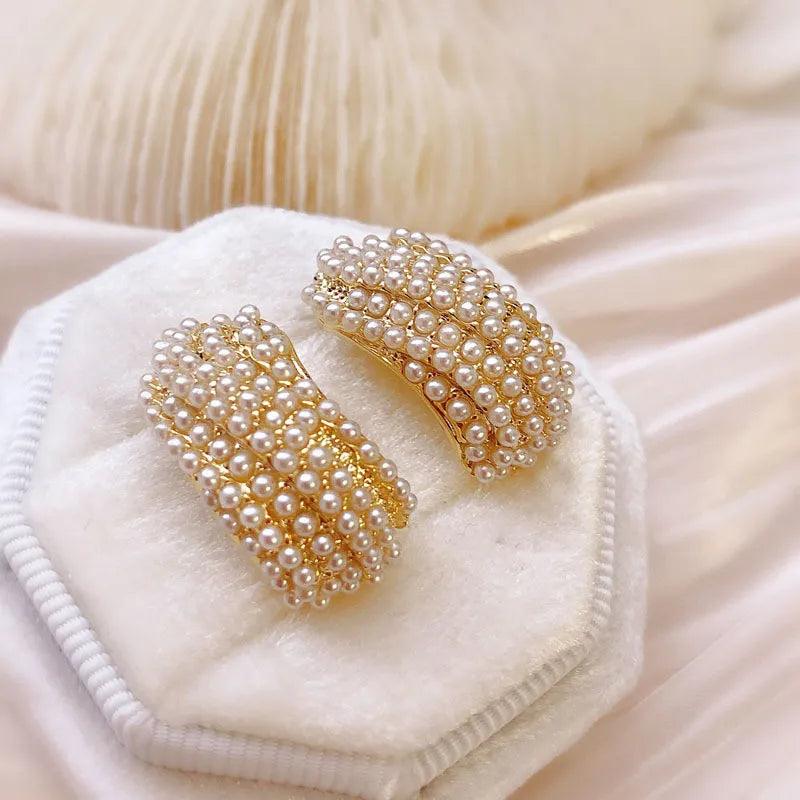 Chic earrings with pearl embellishment