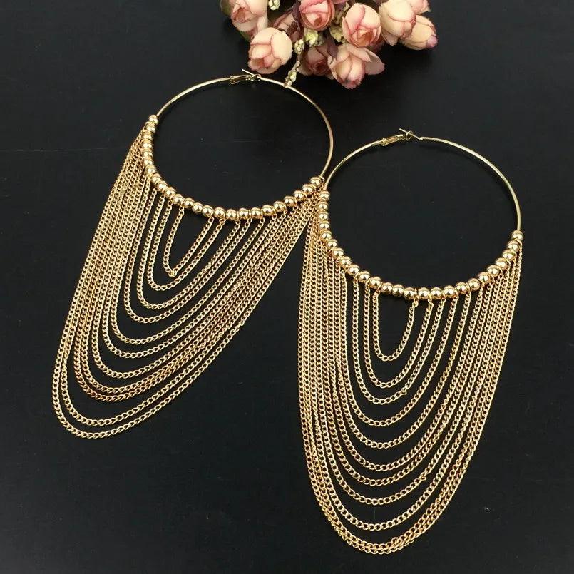 Elegant hoop earrings with pearl tassels