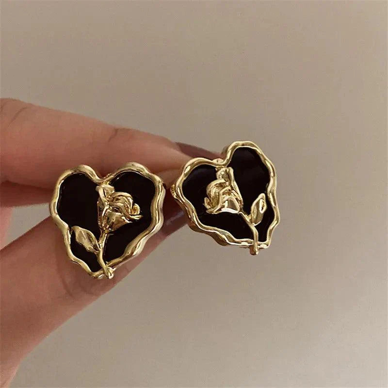 Heart-shaped rose stud earrings